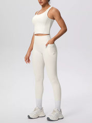 Cream leggings shown from the back at an angled pose