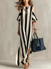 Black and white striped cold-shoulder maxi dress with draped sleeves