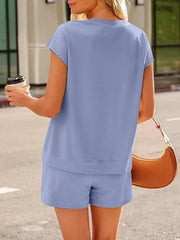 Back view of the slate-blue top and matching shorts.