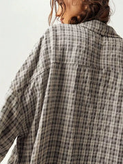 Back view of gray and cream plaid oversized shirt