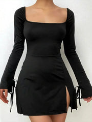 Black square-neck mini dress with long flared sleeves, tie cuffs and a front skirt slit.