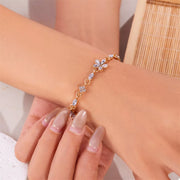 18k gold-plated rhinestone flower bracelet, side view