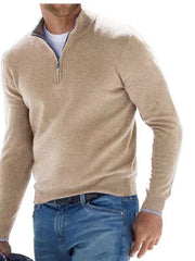 Oatmeal quarter-zip sweater modeled with blue jeans