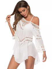 Model wearing a white crochet-trimmed swim cover-up dress