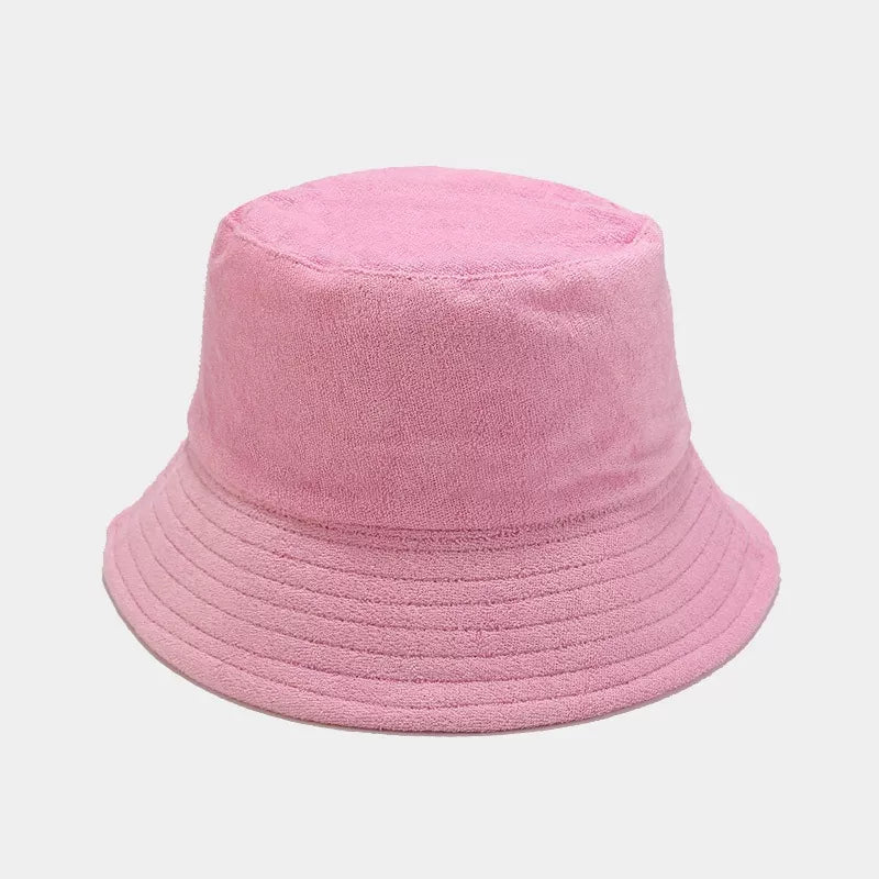 Blue and khaki wide-brim bucket hats shown from the front