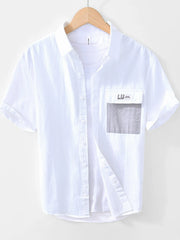 White short-sleeve button-down shirt with chest pocket, front view