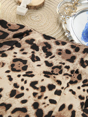 Flat view of leopard-print fabric panel and pattern