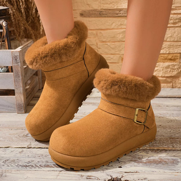 Tan and brown fur-lined ankle boots shown together