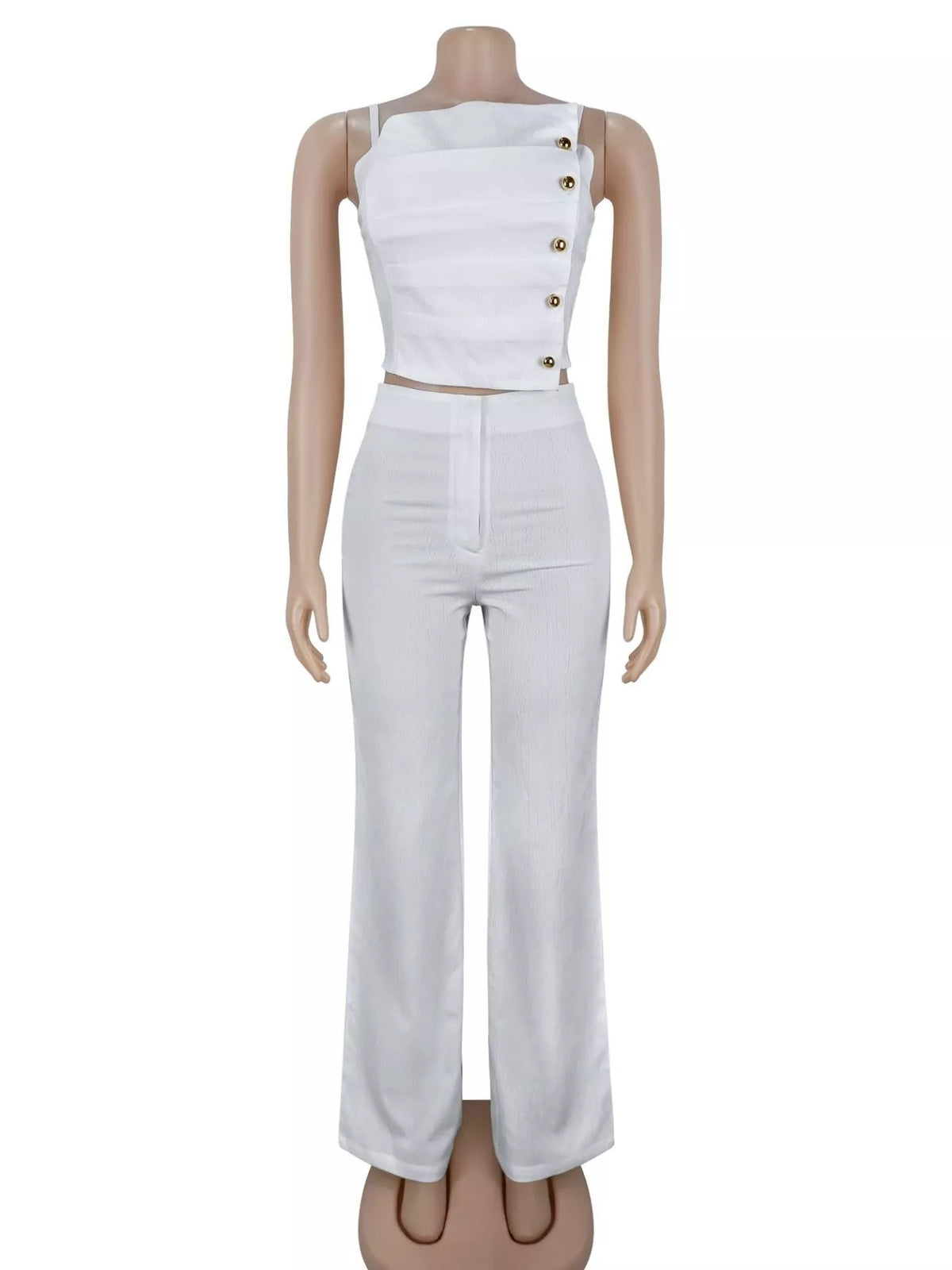 White cami and wide-leg pants set displayed from the front on a mannequin.