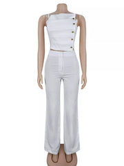 White cami and wide-leg pants set displayed from the front on a mannequin.
