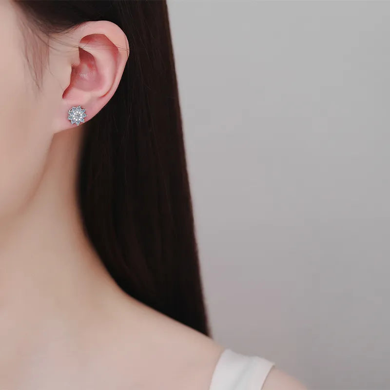 Floral cluster stud earring worn on ear