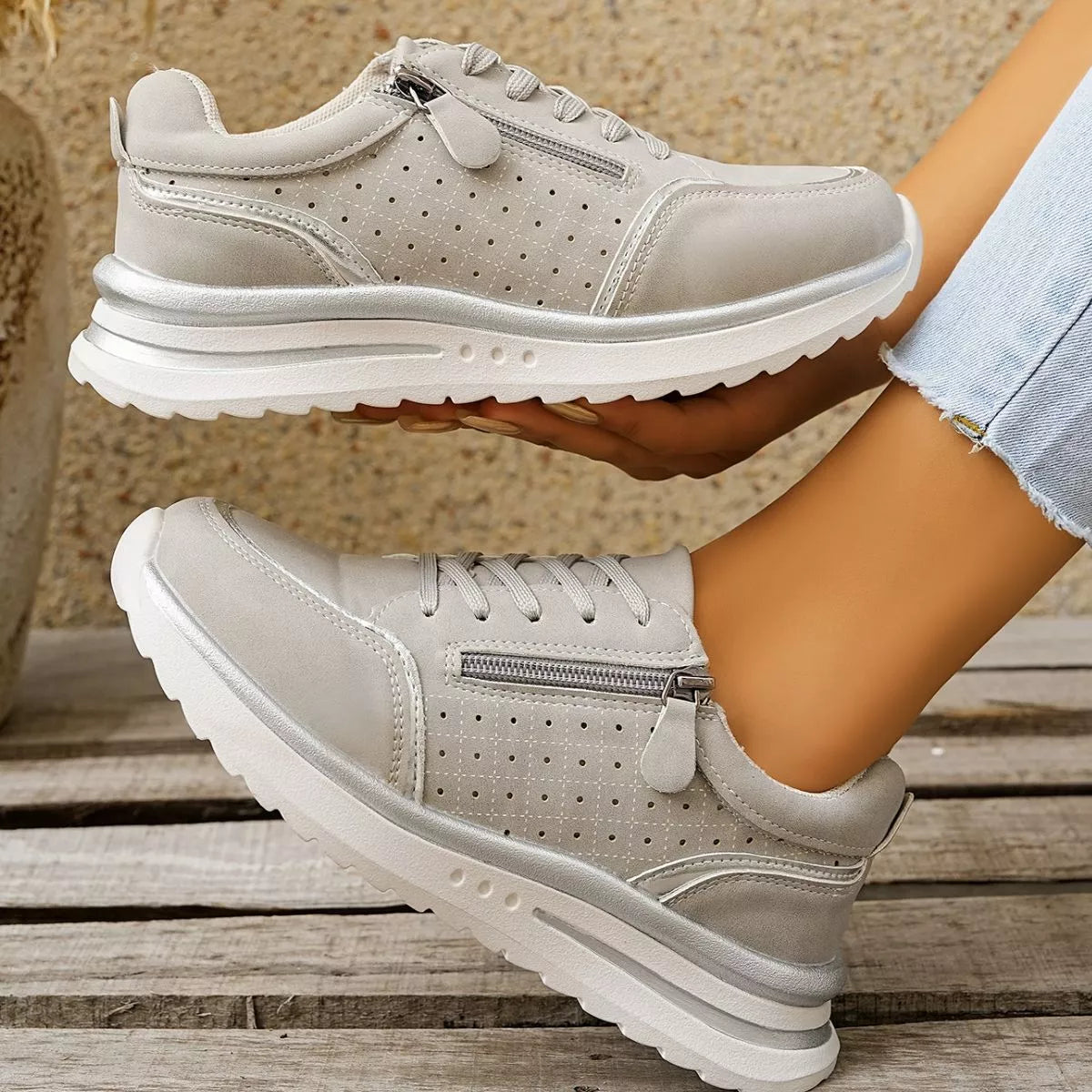 White sneaker shown in profile