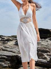 Back view of cream crochet halter cover-up