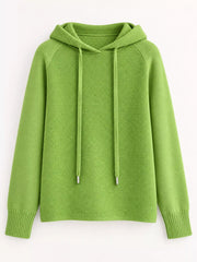 Light green drawstring hooded sweater displayed alone against a pale background.
