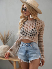 Tan openwork cropped cover-up with flared sleeves, shown from the side.