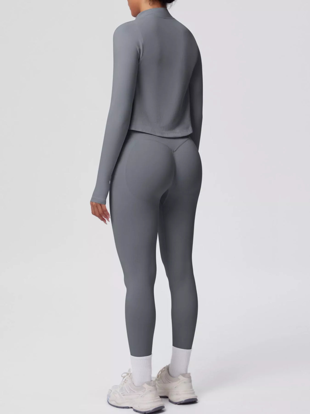 Back view of tank & zip-up jacket and leggings three-piece active set