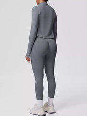 Back view of tank & zip-up jacket and leggings three-piece active set