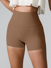 Front view of taupe high-waist active shorts with a smooth wide waistband.