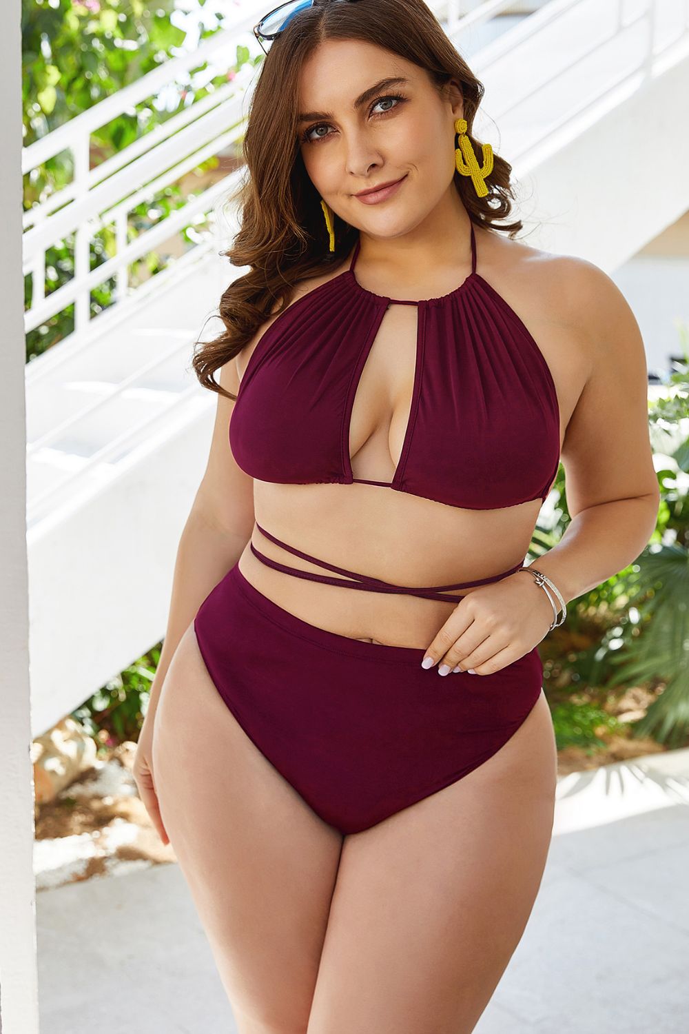 Burgundy halter bikini with a keyhole front and high-waisted bottoms, front view