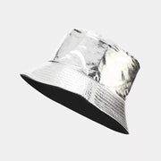 Reflective silver bucket hat with black underside, shown at an angle