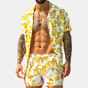White shirt and shorts set with yellow floral print, modeled