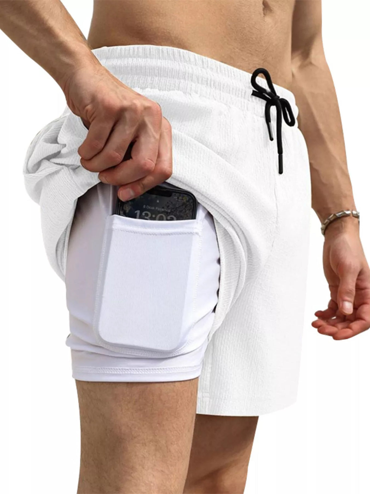 Model showing the inner liner pocket of white shorts