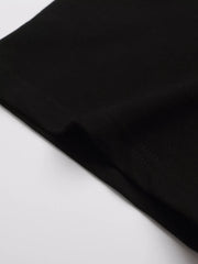 Close-up of black T-shirt fabric and sleeve
