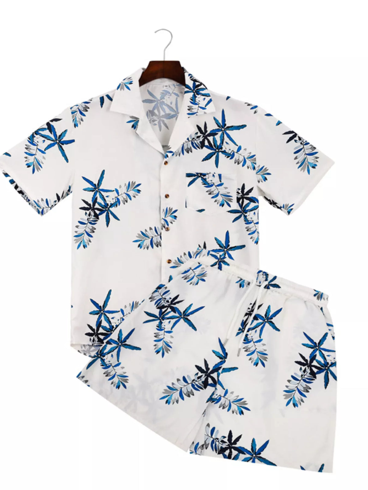 Front view of a white tropical-print short-sleeve shirt and matching shorts set