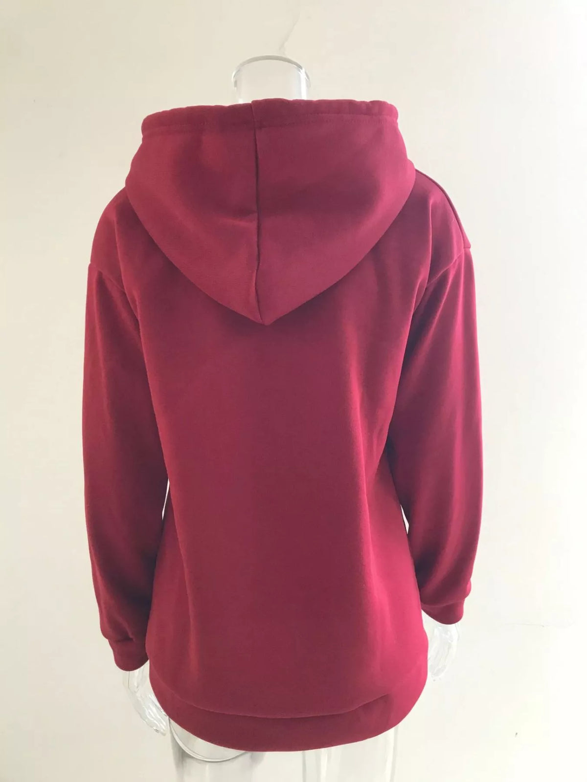 Women’s plus-size kangaroo-pocket drawstring hoodie in wine-red back view on hanger