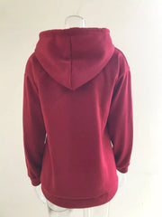 Women’s plus-size kangaroo-pocket drawstring hoodie in wine-red back view on hanger
