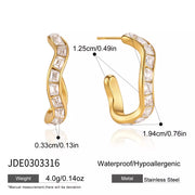 Gold-tone zircon hoop earrings with measurement and product detail graphic