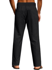 Model wearing black pants, side view