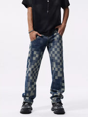 Close front view of blue checkerboard jeans with hands in the pockets