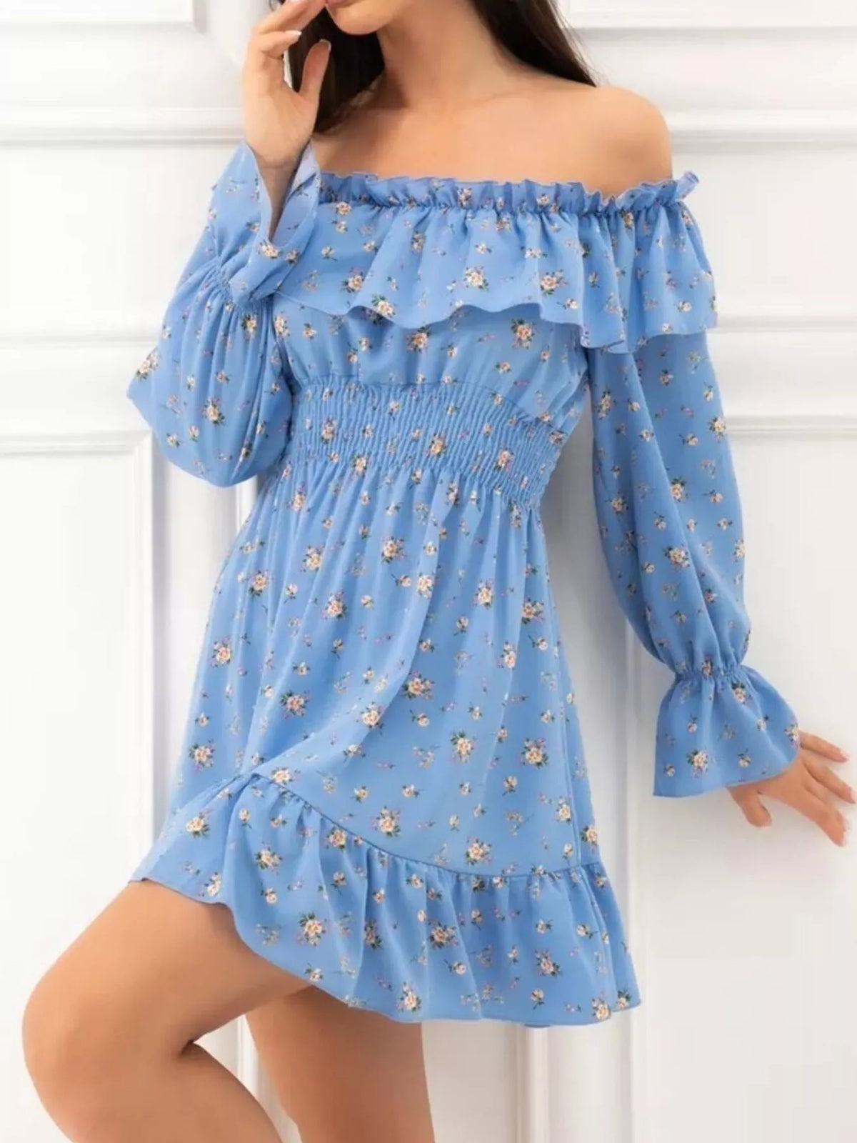 Front view of the blue floral off-shoulder dress showing the gathered bodice and layered skirt.