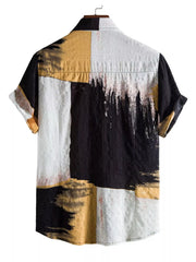 Black, ochre and white color-block button-up shirt shown from the back