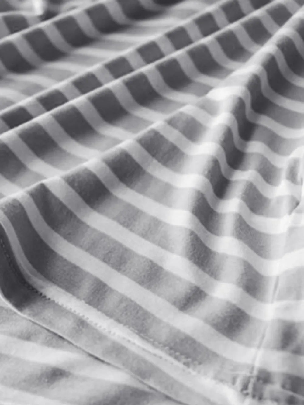 Close-up of gray striped fabric texture