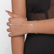 Close-up of rhinestone chain bracelet wrapped across hand