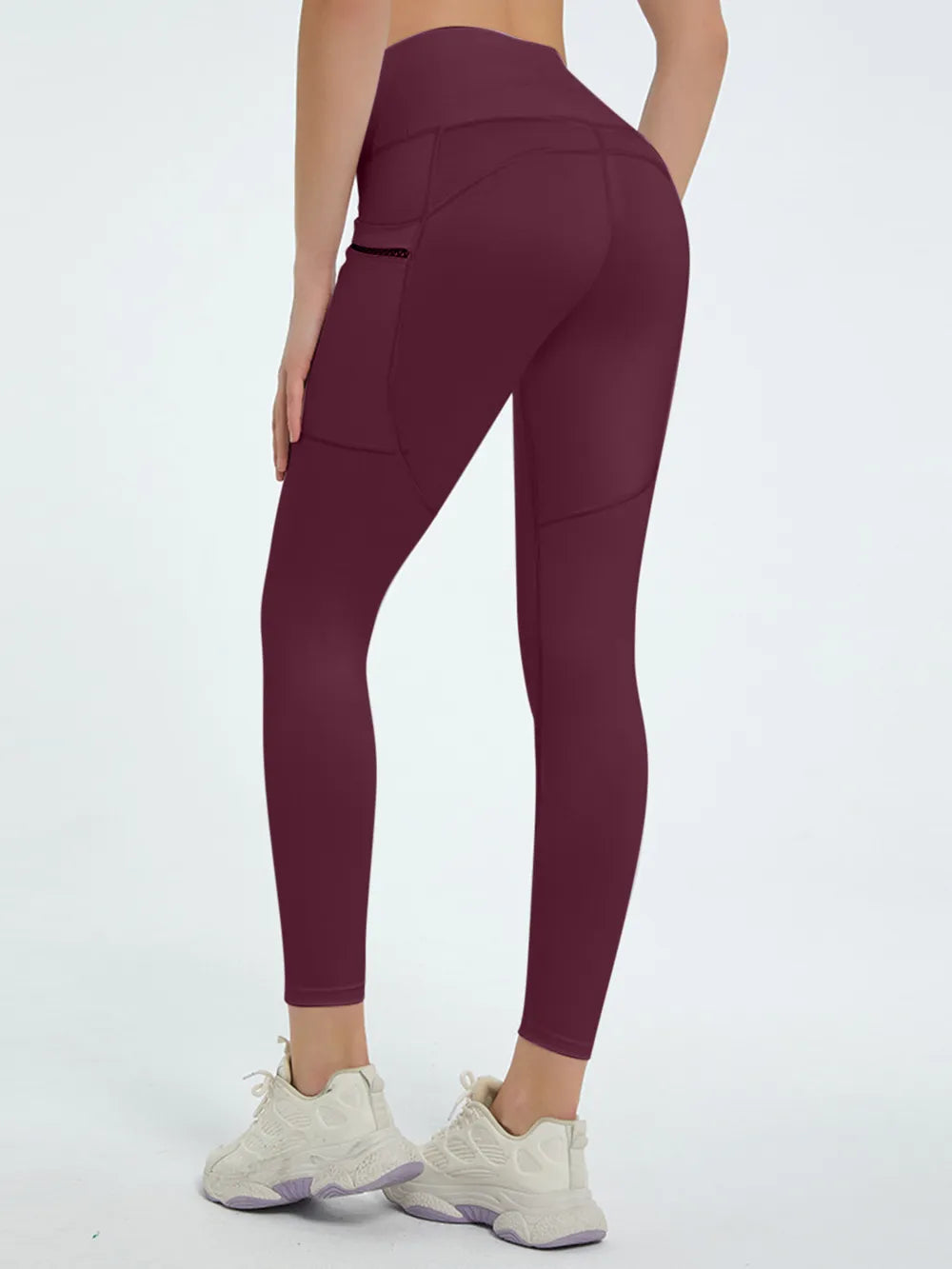 Dark green high-waisted leggings with side pocket