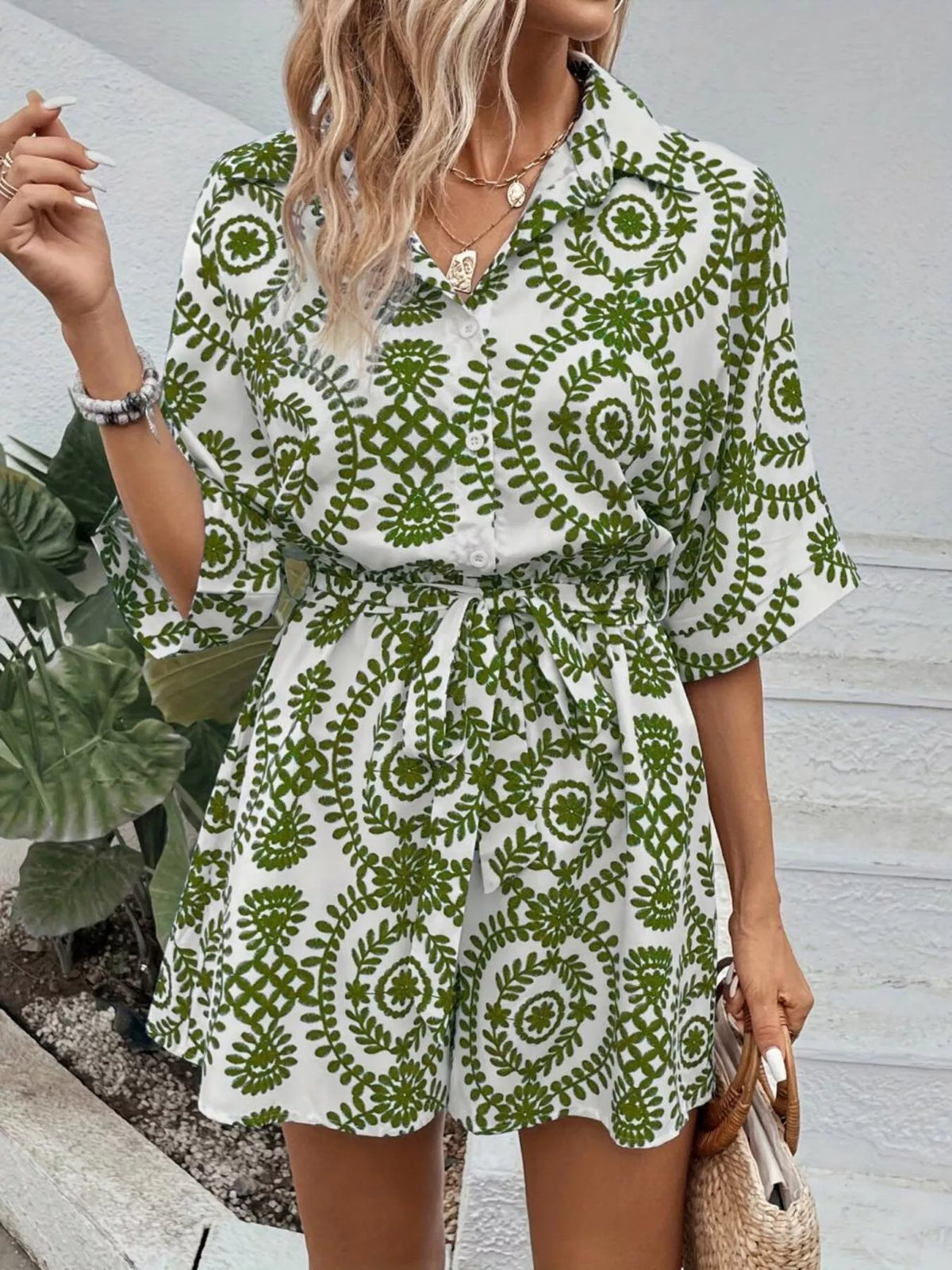 Women's printed tie-waist button-front romper, green-and-white print front view
