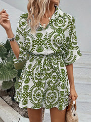 Women's printed tie-waist button-front romper, green-and-white print front view