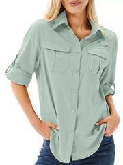Sage green button-down shirt with rolled sleeves, front view on model