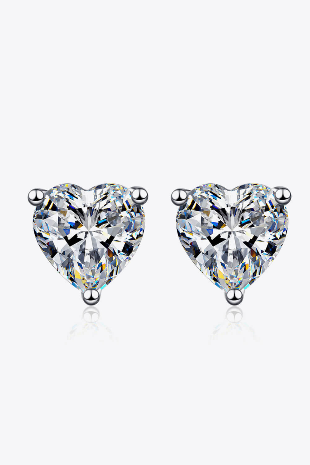 2 Carat Moissanite Heart-Shaped Stud Earrings — Pair of heart-shaped moissanite stud earrings on a white background