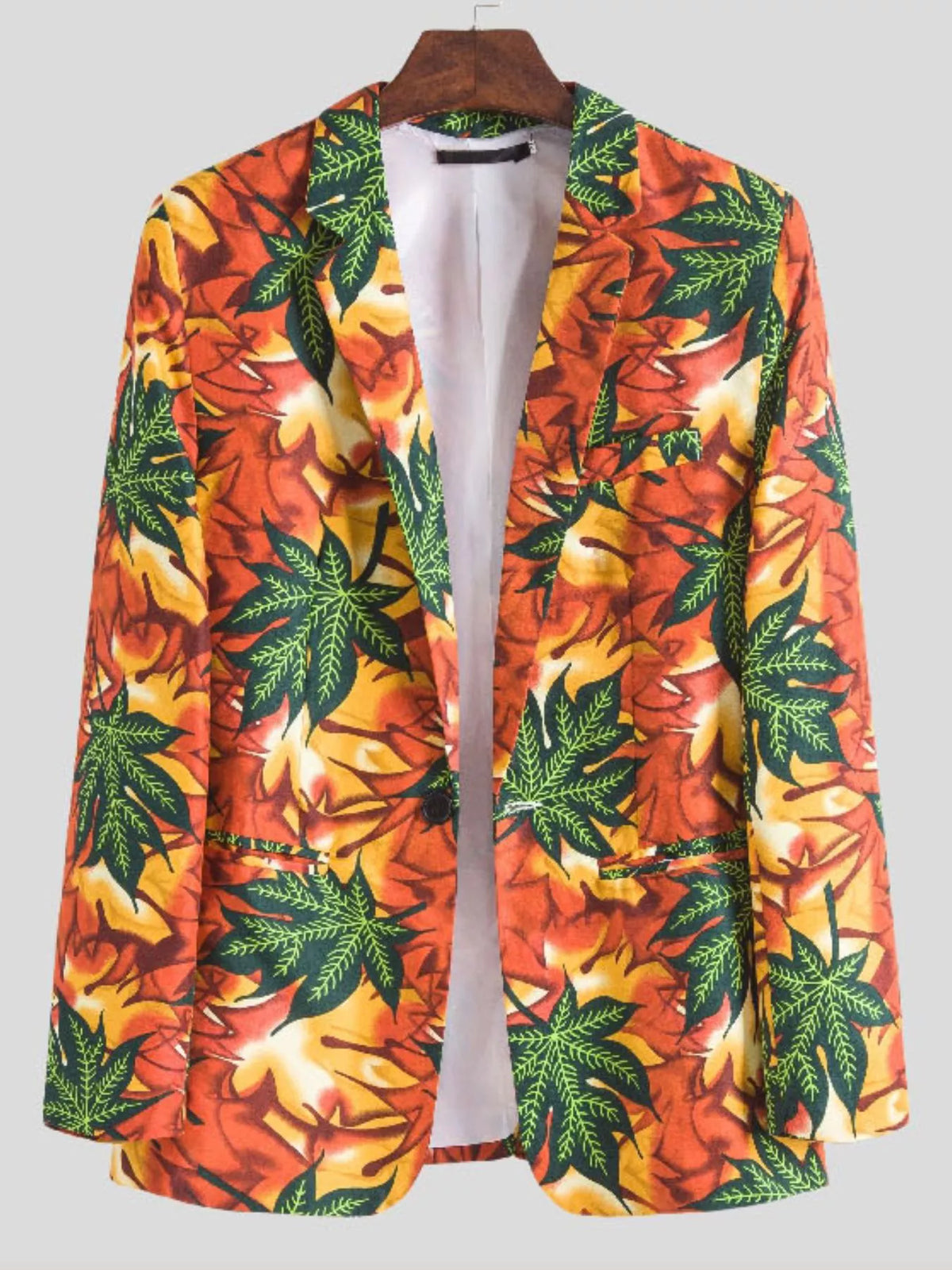 Men's leaf print blazer shown from the front with notched lapels, buttons and flap pockets