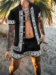 Model wearing black short-sleeve button-up shirt and shorts with white geometric trim