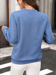 Side view showing the sweatshirt fit