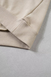 Close view of sleeve seam and cuff construction