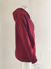 Women’s plus-size kangaroo-pocket drawstring hoodie in wine-red side view on hanger