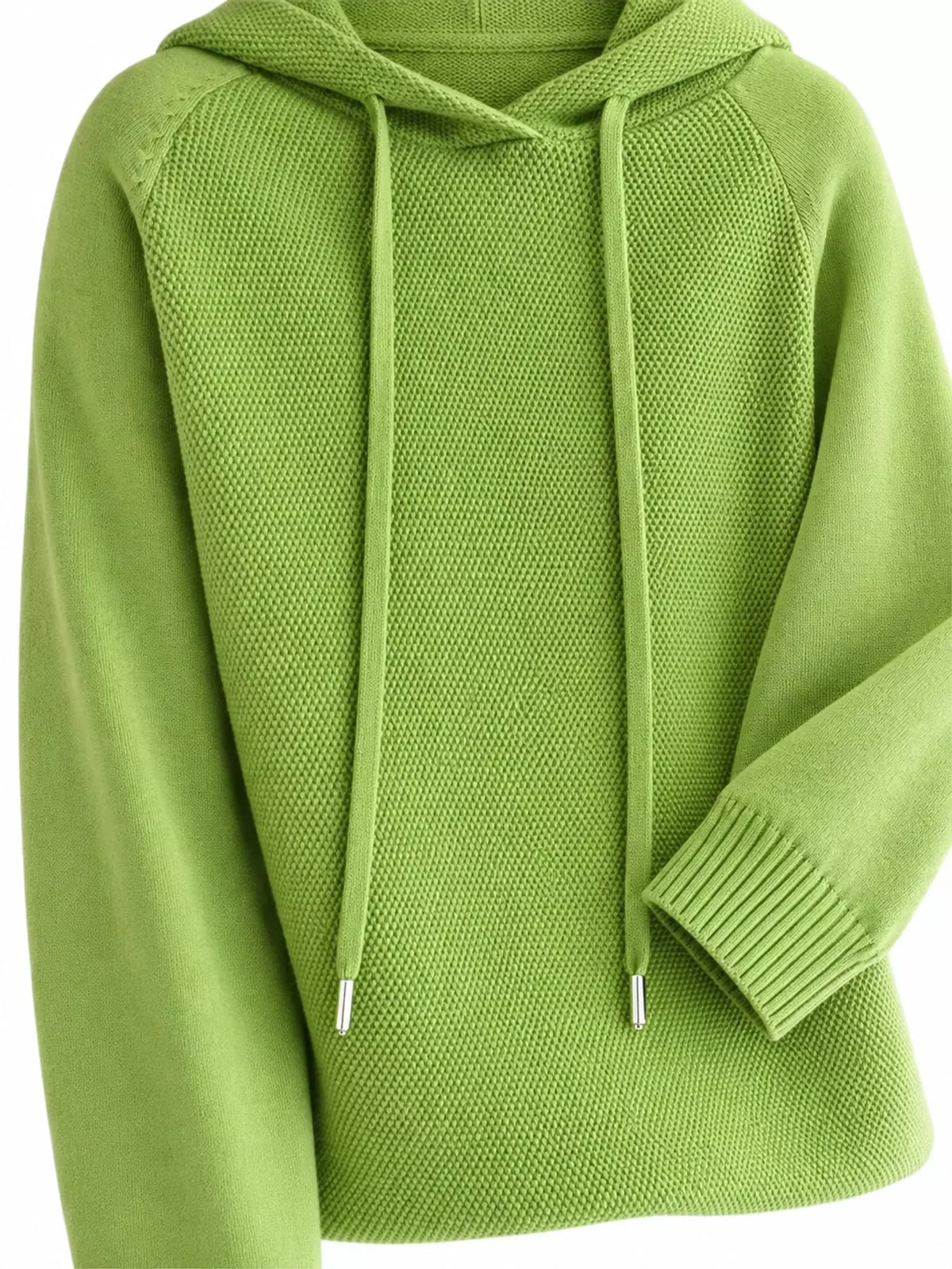 Light green sweater close-up showing the drawstrings, textured knit and ribbed cuff.