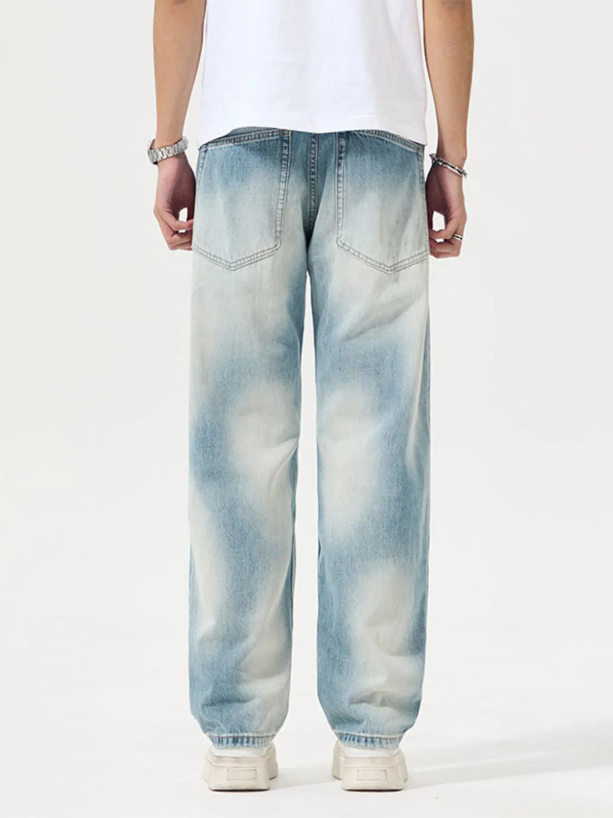 Back view of light-wash relaxed jeans