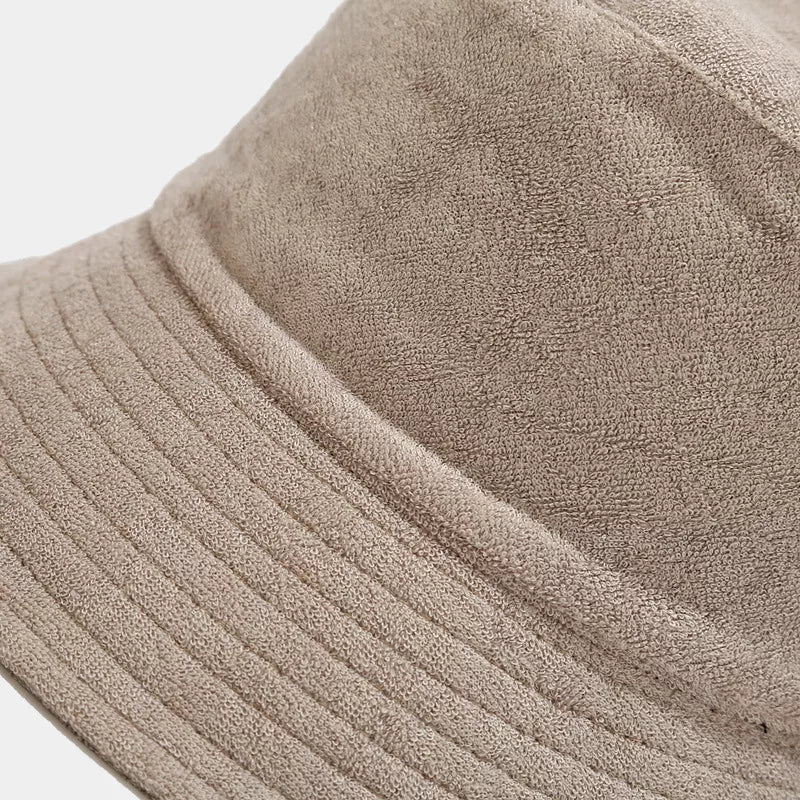 Light purple wide-brim bucket hat shown from the front